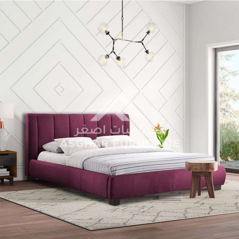 A contemporary bedroom featuring a stylish purple upholstered bed as the focal point of the room's design.