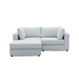 AN elgant 2 piece sofa in a living room