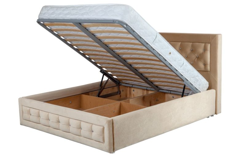 A neatly made bed featuring a storage drawer underneath for added organization and space-saving convenience.